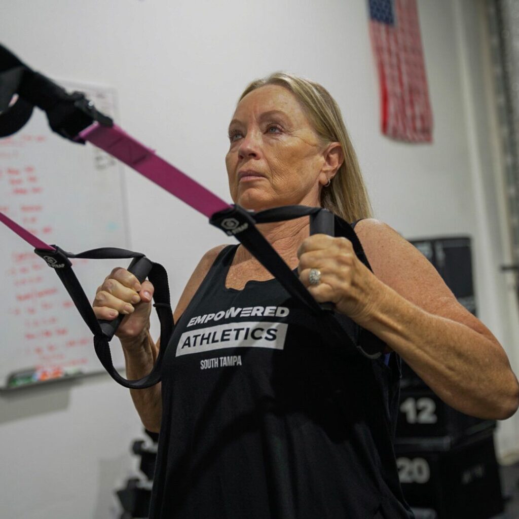 Woman working out at Empowered Athletics Tampa